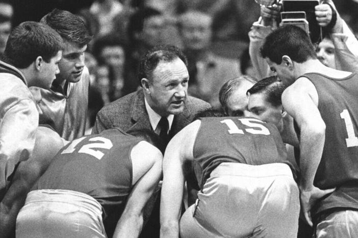 Gene Hackman as coach Norman Dale on the set of 1986's <em>Hoosiers</em>.