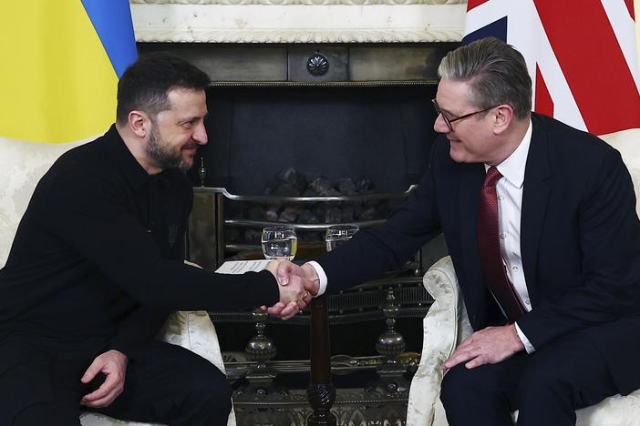 Britain's Prime Minister Keir Starmer, right, and Ukraine's President Volodymyr Zelenskyy, left, shake hands during a meeting at 10 Downing Street in London, England, Saturday, March 1, 2025.