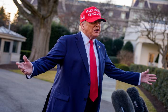 President Trump speaks to members of the media before boarding Marine One on the South Lawn of the White House on Feb. 28.