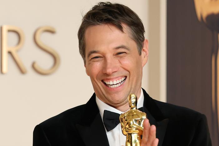 Sean Baker poses in the press room during the 97th Academy Awards.