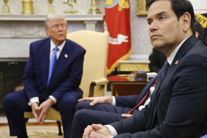 Secretary of State Marco Rubio, right, listens as President Trump, left, meets with France's President Emmanuel Macron in the White House on Feb. 24.