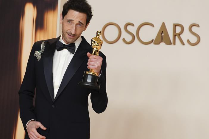 Adrien Brody, winner of the award for best performance by an actor in a leading role for <em>The Brutalist</em>, poses in the press room at the Oscars on Sunday, March 2 at the Dolby Theatre in Los Angeles.