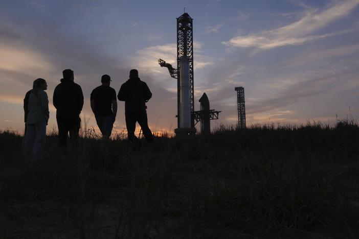 Visitors watch as SpaceX's mega rocket Starship is prepared for a test flight from Starbase in Boca Chica, Texas, Sunday, March 2, 2025.