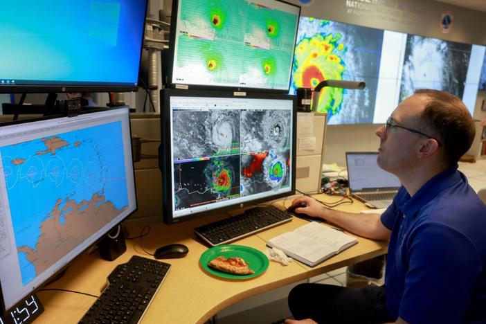 Brad Reinhart, senior hurricane specialist at the National Hurricane Center, tracks Hurricane Beryl, the first hurricane of the 2024 season, at the National Hurricane Center on July 1, 2024, in Miami.