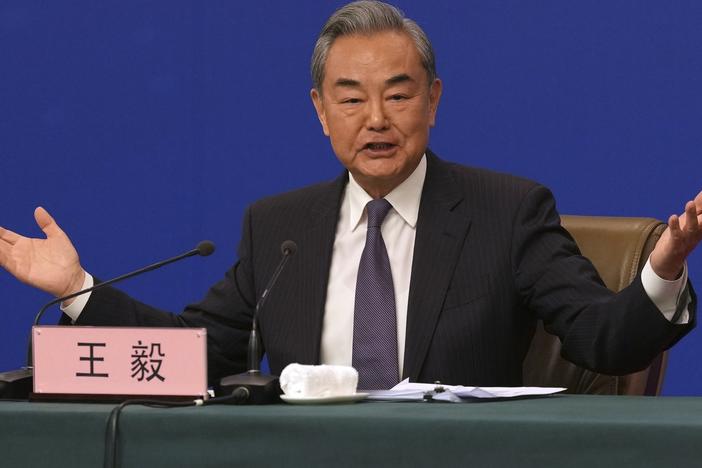 Chinese Foreign Minister Wang Yi speaks during a press conference on the sideline of the National People's Congress in Beijing on Friday.
