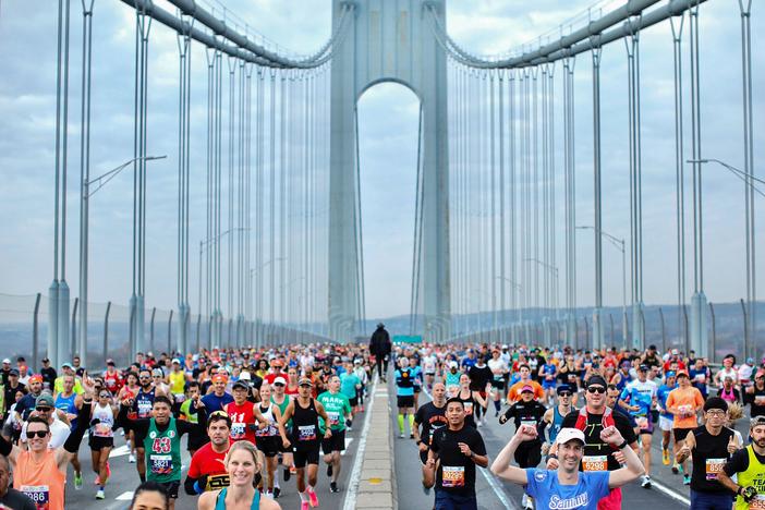 Runners cross the Verrazano Bridge before competing in the 52nd Edition of the New York City Marathon on November 5, 2023.