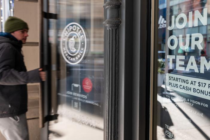 U.S. employers continued to add jobs last month, but layoff notices have also increased to their highest level since the early months of the COVID-19 pandemic.