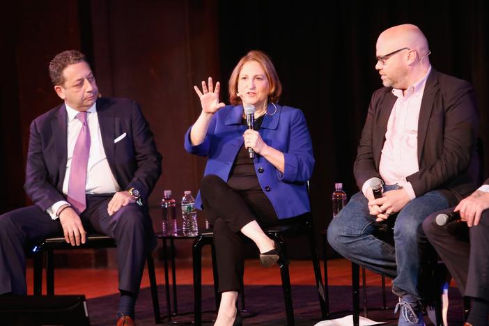 Washington Post columnist Ruth Marcus (in a blue jacket) speaks on stage during a panel at the New Yorker Festival in 2018.
