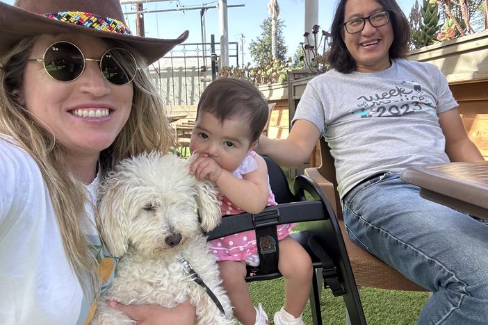 Faced with isolation during the early weeks of the COVID-19 pandemic, James Yu of San Diego, Calif., embraced new priorities — like starting a family. Here, Yu is seen with his wife, Barbara, daughter Madeleine and their dog Quilo.