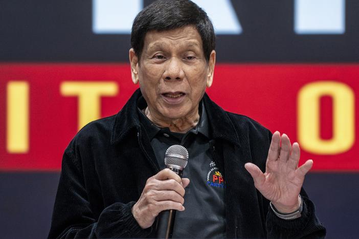 Former President of the Philippines Rodrigo Duterte speaks inside the Southorn Stadium during a thanksgiving gathering organized by Hong Kong-based Filipino workers for the former populist president in Hong Kong on March 9, 2025.