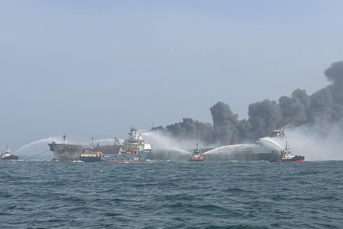 Fire and rescue services attend after a collision between oil tanker MV Stena Immaculate and the cargo vessel MV Solong off the coast of the Humber Estuary on Monday.