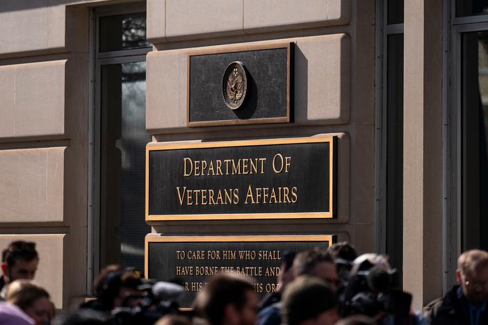 Protestors gathered outside the Department of Veterans Affairs headquarters in Washington, DC, US, on Feb. 13, 2025. The agency plans to cut 80,000 jobs.