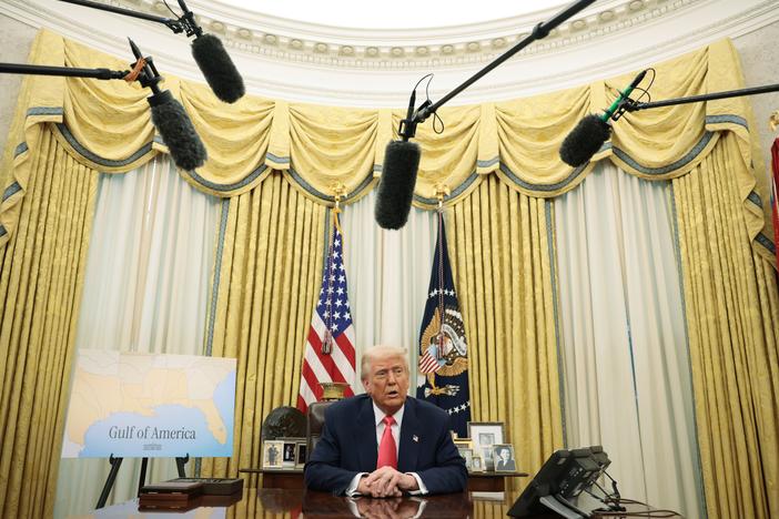 President Trump speaks as he signs executive orders in the Oval Office on March 6, including the order against the law firm Perkins Coie.