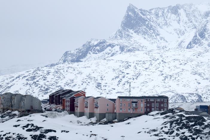 Homes built into the rugged landscape in Nuuk, Greenland, are seen on March 12. The self-ruling Danish territory has been thrust into the geopolitical spotlight as President Trump has vowed to acquire it.