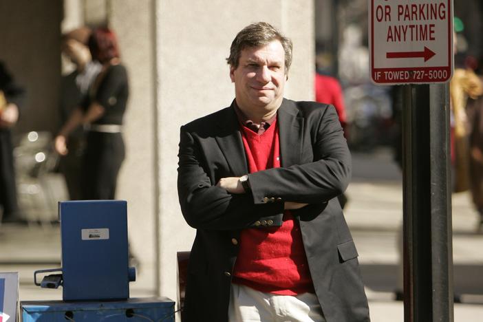 Sports writer and author John Feinstein poses in Washington, Feb. 28, 2006.