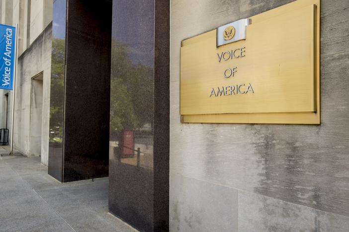 President Trump's late-night decree Friday led to orders gutting the Voice of America and other U.S.-funded international broadcasters.
