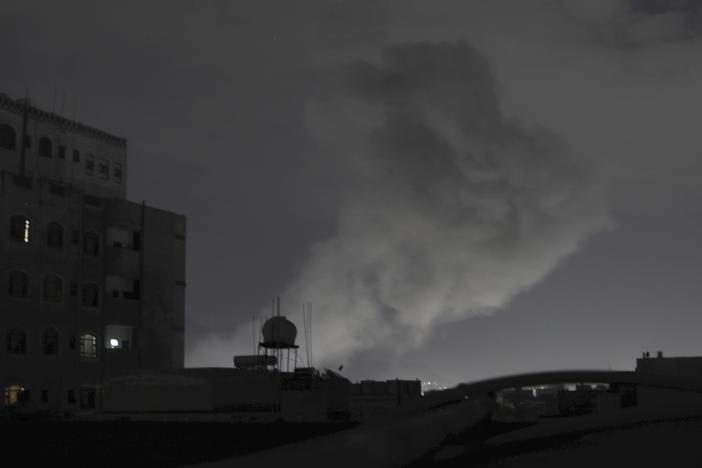 Smoke rises from a location reportedly struck by U.S. airstrikes in Sanaa, Yemen, on Saturday.
