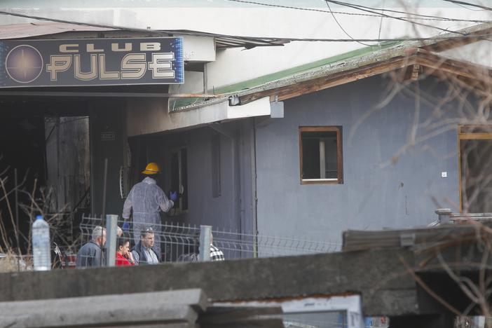 A firefighter inspects a nightclub after a massive fire in the town of Kocani, North Macedonia, on Sunday.