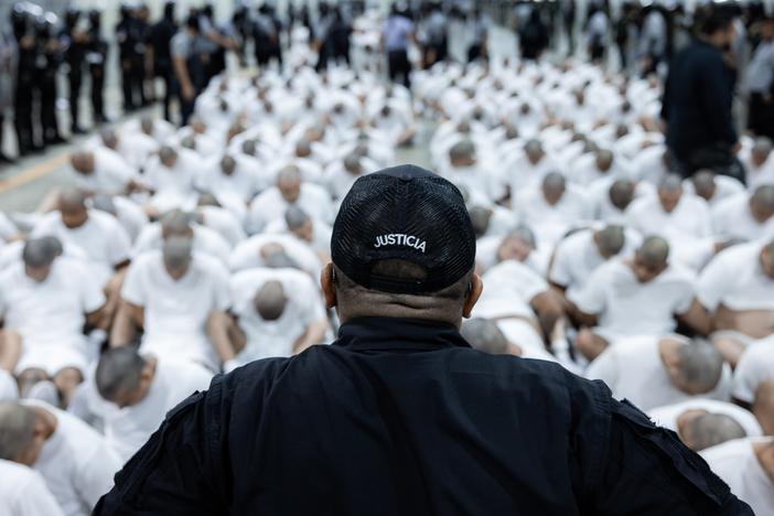 About 250 suspected gang members arrive in El Salvador by plane in this photo from Sunday, including 238 members of Venezuela's Tren de Aragua gang and 23 members of the MS-13 gang, who were deported to El Salvador by the U.S.. El Salvador's President Nayib Bukele confirmed they will be sent to the country's mega-prison CECOT, the Terrorism Confinement Center.