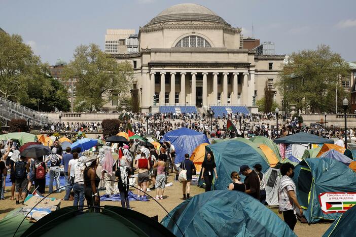 Student protesters gather inside their encampment on the Columbia University campus in New York on April 29, 2024.
