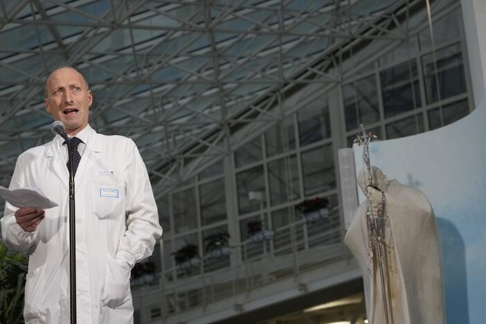 Surgeon Sergio Alfieri speaks to journalists on Saturday in the entrance hall of Rome's Agostino Gemelli Polyclinic, where Pope Francis has been receiving treatment for bilateral pneumonia.
