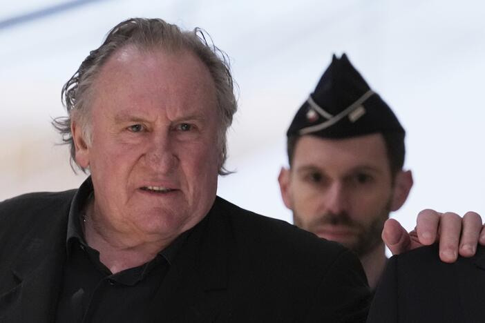 Actor Gerard Depardieu arrives to face trial for the alleged sexual assaults of two women on a film set in 2021 on Monday.