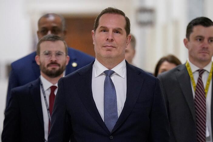 Pete Marocco (center), who served as deputy administrator for USAID in the new Trump administration until last week, arrives at Capitol Hill on March 5 to meet with members of Congress to discuss foreign assistance. He was on staff at the agency during the first Trump administration — and both times sought to cut many of its programs.