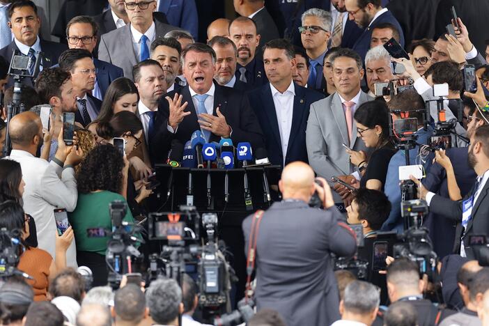 Former Brazilian President Jair Bolsonaro speaks to reporters after the Supreme Court voted that he should stand trial for allegedly attempting a coup after his 2022 electoral defeat, in Brasilia, Brazil, Wednesday.