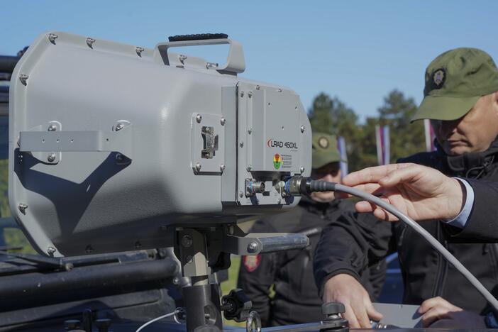 In this photo provided by the Serbian Interior Ministry, Serbian Gendarmerie officers show the U.S.-made Long Range Acoustic Device (LRAD) – which is illegal in Serbia and many other countries, in Belgrade, Serbia on March 19, 2025.