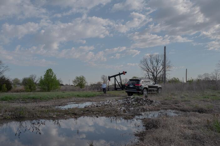 Scott Rabinowitz, president of Grand Resources, stands near a pump jack in Sperry, Okla., on March 20, 2024.