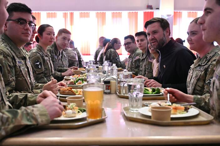Vice President Vance (at right), seated next to second lady Usha Vance, eats at a table with service members at the U.S. military's Pituffik Space Base, in Pituffik, Greenland, on March 28.