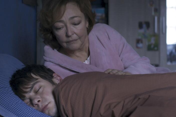 Jérémie (Félix Kysyl) stays with the newly widowed Martine (Catherine Frot) in the French thriller <em>Misericordia</em>.