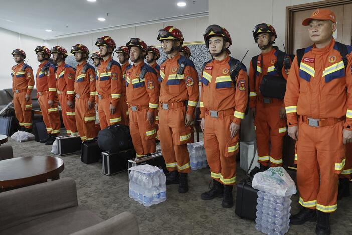 In this photo released by Xinhua News Agency, Chinese rescuers arrive at the Yangon International Airport in Yangon, Myanmar on Saturday, March 29, 2025.