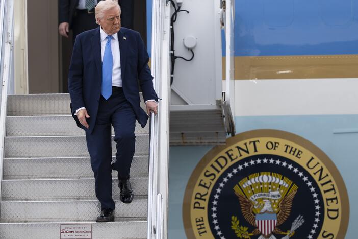 President Donald Trump arrives on Air Force One at Palm Beach International Airport, Friday, March 28, 2025, in West Palm Beach, Fla. (AP Photo/Manuel Balce Ceneta)
