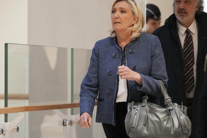 French far-right leader Marine Le Pen arrives at a Paris court expected to deliver a verdict in an embezzlement case that could shake up French politics and derail far-right leader Marine Le Pen's career Monday, March 31, 2025 in Paris.