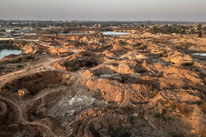 The site of a former lead and zinc mine in Kabwe, Zambia. Thirty years after the closure of the mine, the land remains highly contaminated — and artisanal miners continue to work here, exposing themselves daily to dangerously high levels of lead.