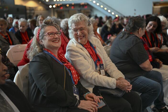 Elizabeth Kenward, left, and "Rosie" Maxine Boeve giggle together during the Rosie the Riveter Congressional Gold Medal Commemoration at the World War II Museum in New Orleans, La., on Friday,  March 21, 2025.