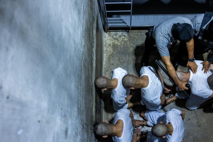 17 members of Venezuela's Tren de Aragua gang and members of the MS-13 gang, who were deported to El Salvador by the US in San Salvador, El Salvador on March 31, 2025. El Salvador's President Nayib Bukele confirmed they will be sent to the country's infamous mega-prison at CECOP facility prison. San Salvador forces took heavy security measures.