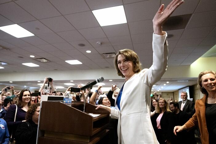Judge Susan Crawford greets supporters in Madison, Wis., Tuesday after winning a seat on the Wisconsin Supreme Court.