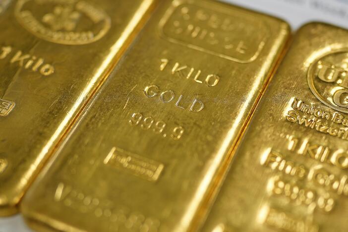 Gold prices have been hitting record highs. Pictured are gold bullion bars in Birmingham, England on Dec. 13, 2023.