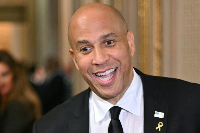 Sen. Cory Booker (D-NJ) speaks to the press at the U.S. Capitol in Washington on Wednesday. Booker spoke for more than 25 hours against President Trump's "unconstitutional" actions.