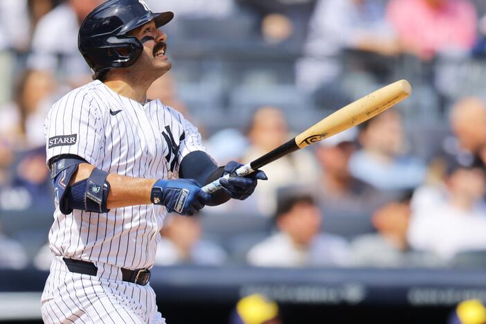 The New York Yankees' Austin Wells hits a home run using a torpedo bat against the Milwaukee Brewers at Yankee Stadium on Saturday. The bats' distinctive shape quickly became the talk of the new baseball season.