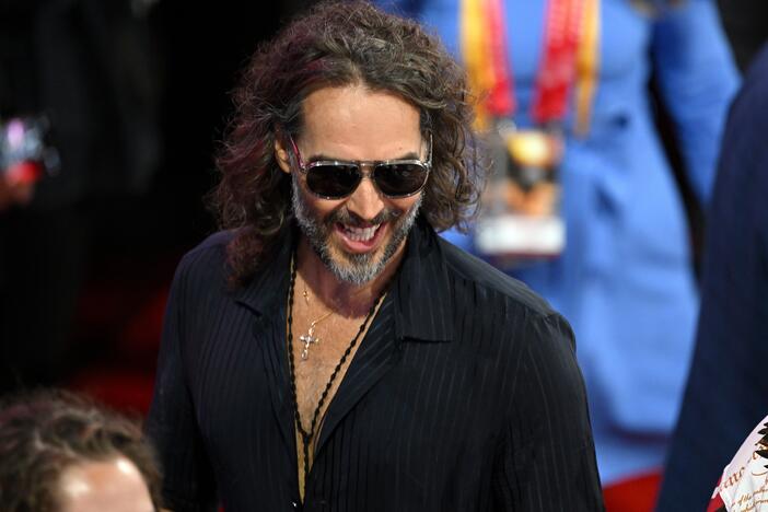 Comedian and actor Russell Brand is facing criminal charges in England over rape and sexual assault allegations that span some six years. He's seen here attending the Republican National Convention in July.
