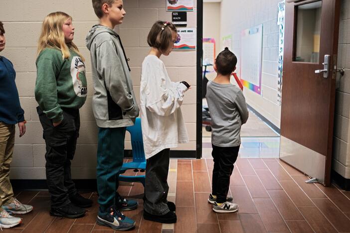 Kellen Hedler leads his fellow classmates at Frontier Elementary School near Oklahoma City. Kellen has Down syndrome, a genetic condition that causes a range of physical and developmental challenges.