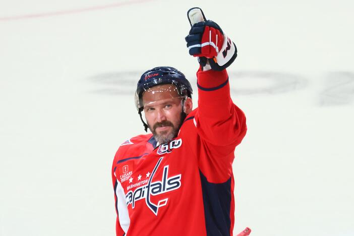 Alex Ovechkin of the Washington Capitals celebrates after defeating the Chicago Blackhawks and scoring his 894th career goal at Capital One Arena on Friday in Washington, DC. Ovechkin's goal ties him with Wayne Gretzky for the all-time goal scoring record.