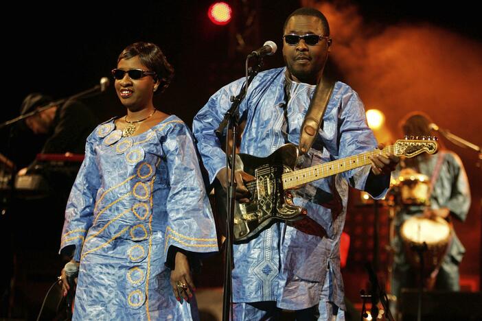 FILE - Blind duo from Mali, Amadou Bagayoko, right, and Mariam Doumbia, seen, during a concert in Paris, Monday, Dec. 1, 2008.