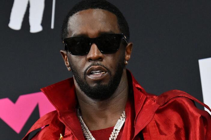 US producer-musician Sean "Diddy" Combs poses with the Global Icon award in the press room during the MTV Video Music Awards at the Prudential Center in Newark, New Jersey, on September 12, 2023.