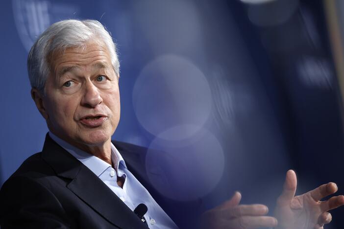 JPMorgan Chase CEO Jamie Dimon, pictured at a meeting in October, warned Monday that tariffs will raise prices, slow economic growth and hurt the country's global standing.