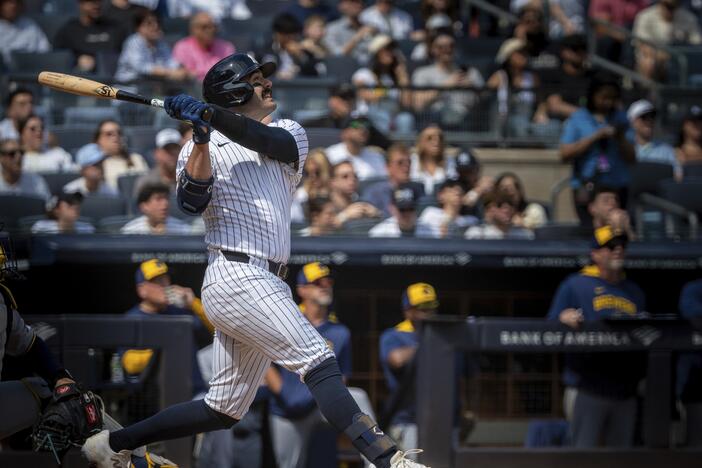 Austin Wells of the New York Yankees hits a home run in the first inning of the Yankees' game against the Milwaukee Brewers on March 29. The Yankees went on to win 20-9. Wells was using what some have dubbed a "torpedo bat."