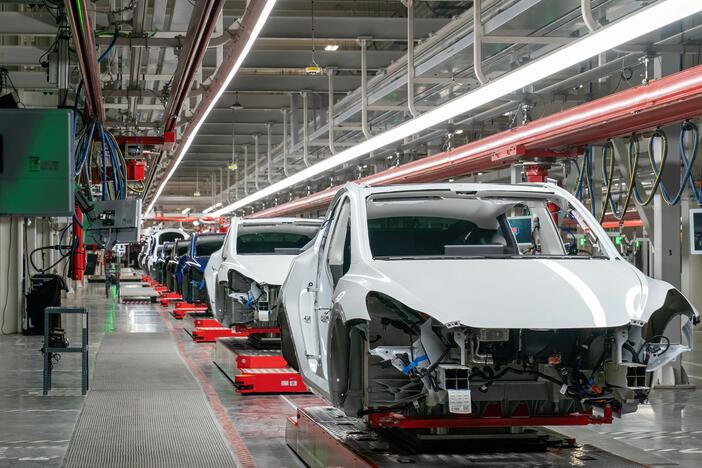 Cars on the Tesla assembly line at the Gigafactory Texas facility on April 7, 2022 in Austin, Texas. Teslas sold in the U.S. are all built in the U.S. But presidential advisor Peter Navarro insinuated this week that they weren't as "made in America" as they seem — a claim Elon Musk has pushed back on.